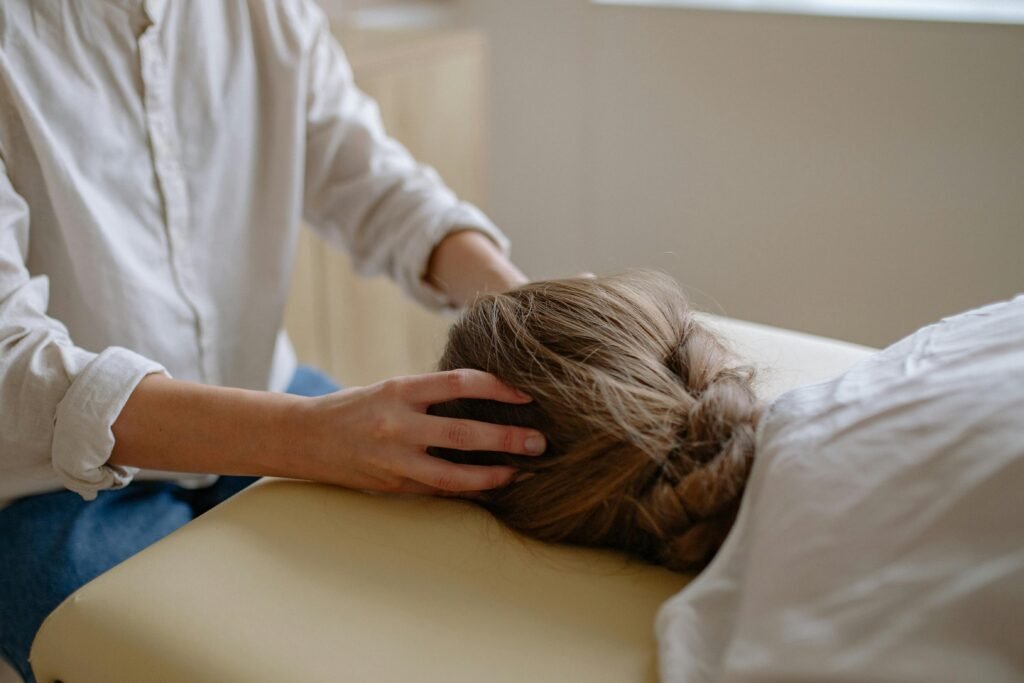 Serene indoor head massage session focusing on relaxation and wellness.